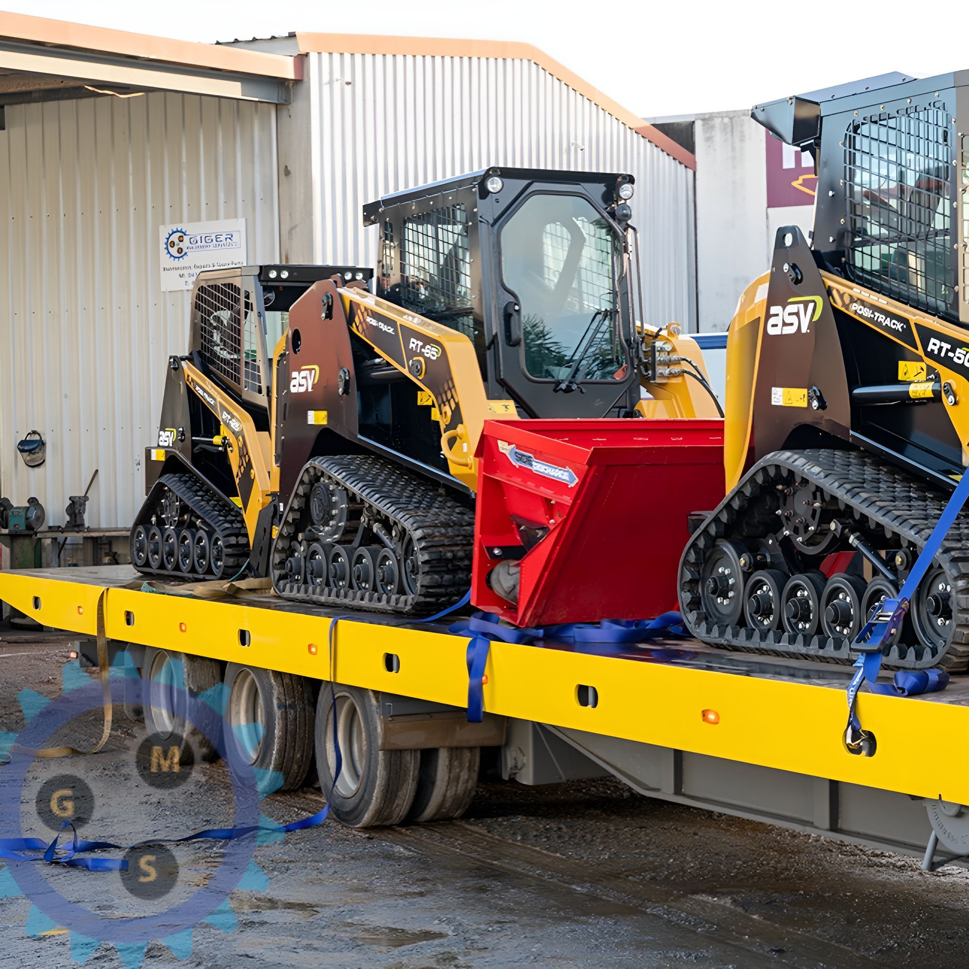 Giger mobile support vehicle and Kobelco excavator parked outdoors